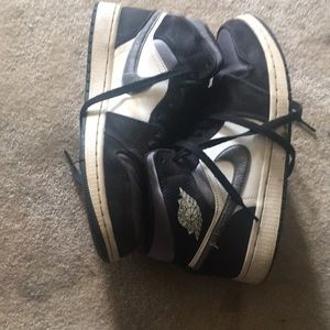 Jordan’s they are grey and white size 9’s in kids.